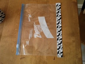 Wrap bag with tape lengthwise